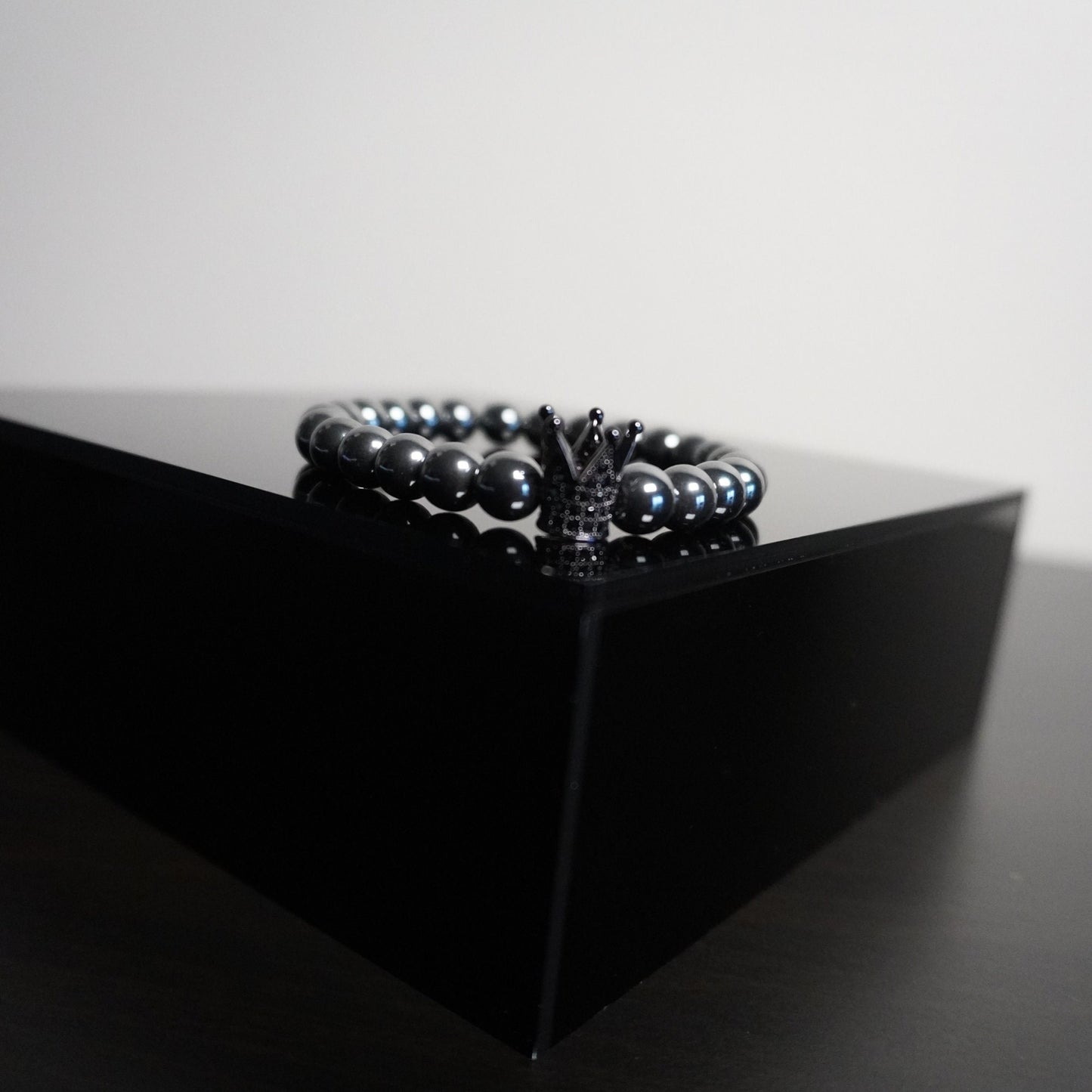 Regal Crown Hematite Bracelet - Elegant Gemstone Beaded Bracelet with Charm Accents for Sophisticated Style
