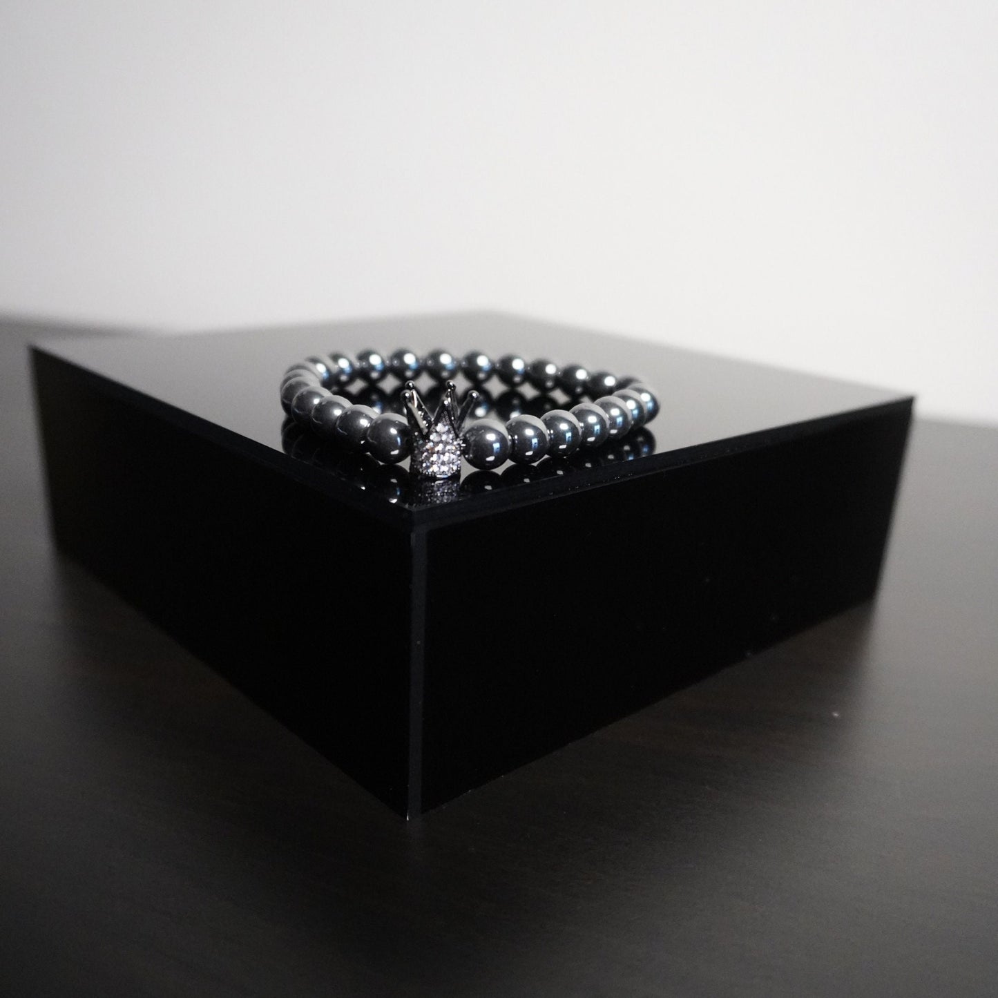 Regal Crown Hematite Bracelet - Elegant Gemstone Beaded Bracelet with Charm Accents for Sophisticated Style