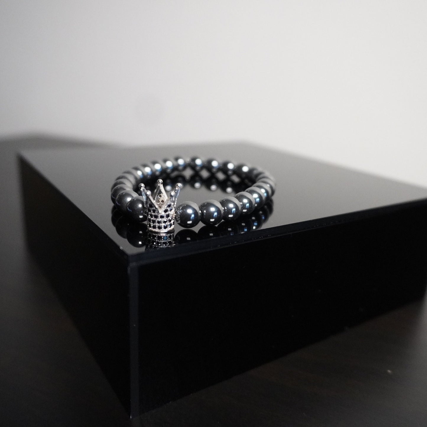 Regal Crown Hematite Bracelet - Elegant Gemstone Beaded Bracelet with Charm Accents for Sophisticated Style