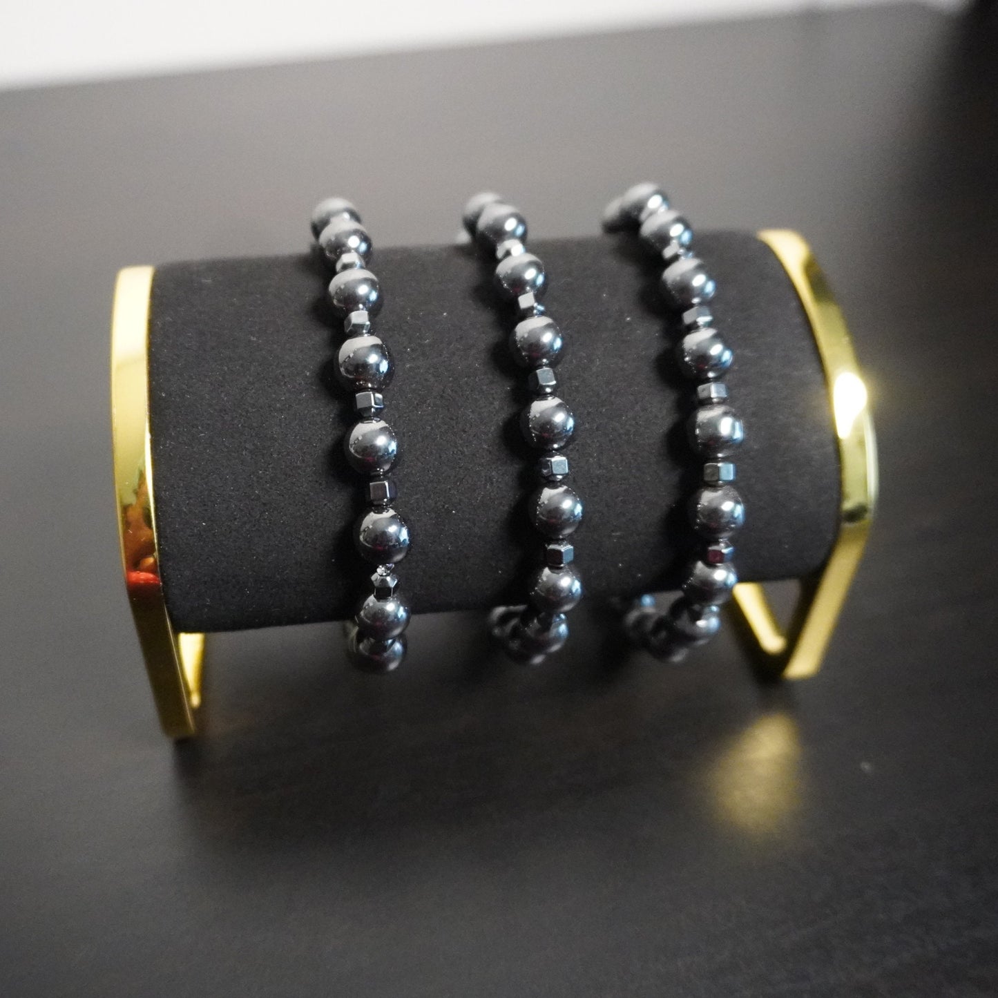 Hematite Beaded Bracelet with Cone Accents: Elegant Unisex Jewelry
