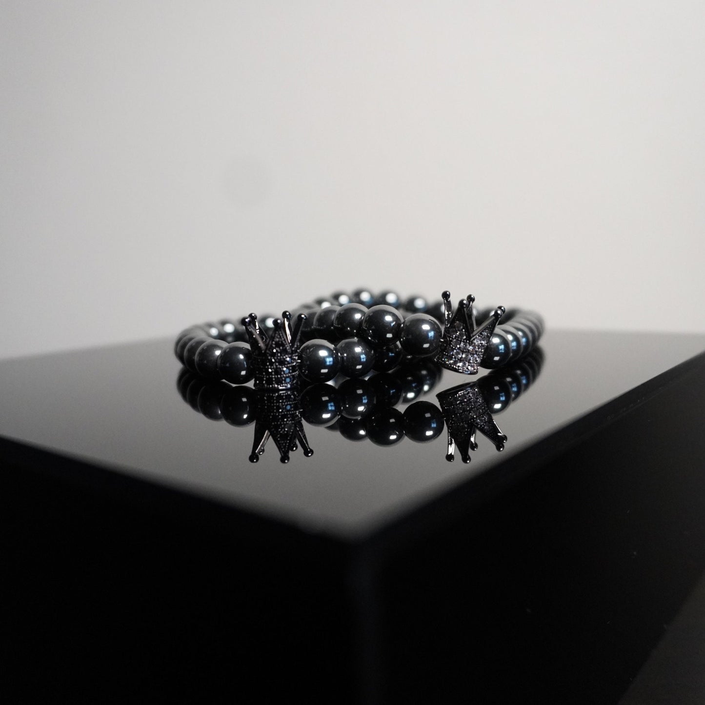 Regal Crown Hematite Bracelet - Elegant Gemstone Beaded Bracelet with Charm Accents for Sophisticated Style