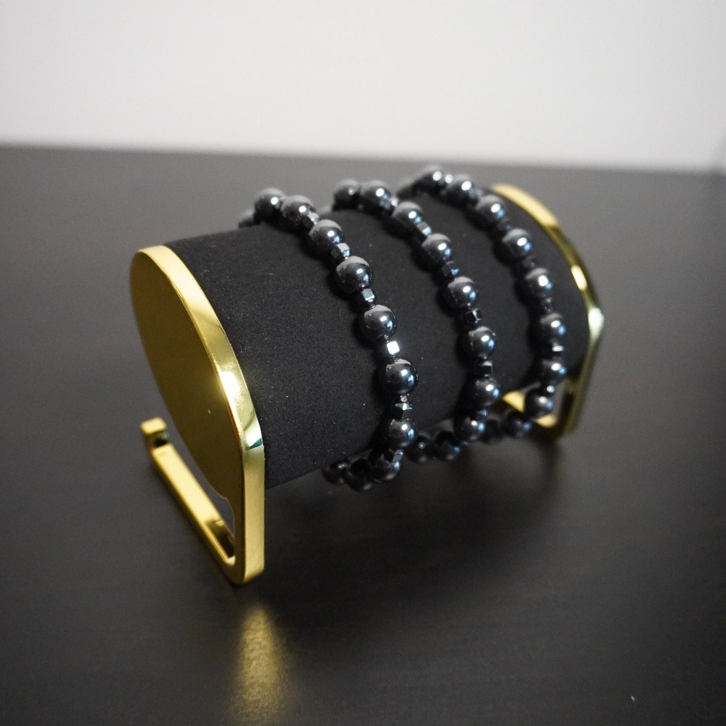 Hematite Beaded Bracelet with Cone Accents: Elegant Unisex Jewelry