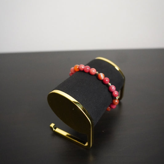 Handcrafted Pink Beaded Bracelet: Textured Accent Jewelry